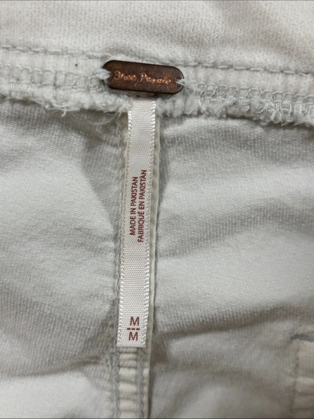 Free People “In my feelings” velvet Cream side zip stretch mid rise crop pants M